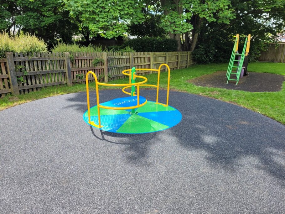 Brighton green and blue coloured children's play area roundabout
